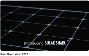 Image of black 7 white Solar Sharc Panels & wording "Introducing Solar Sharc TM" from the 'Solar Sharc' WM Cline Commercial Voiceover Video